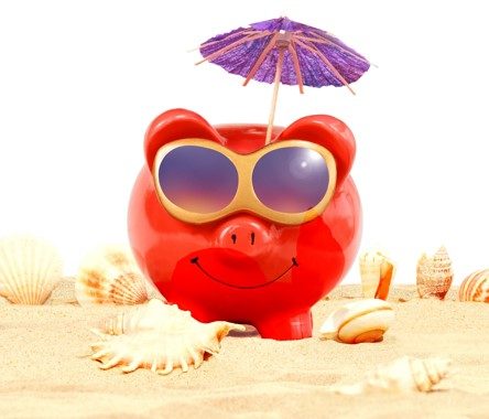 Piggy bank on the beach